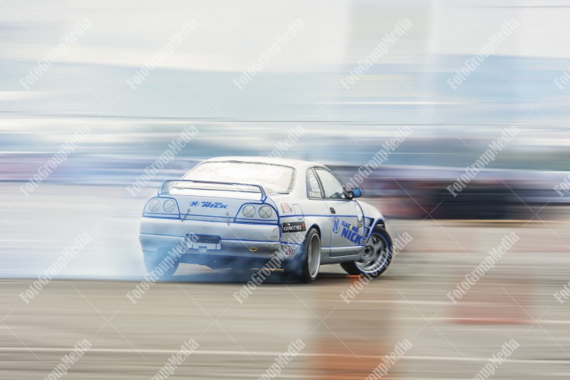 Sport car wheel drifting and smoking on track