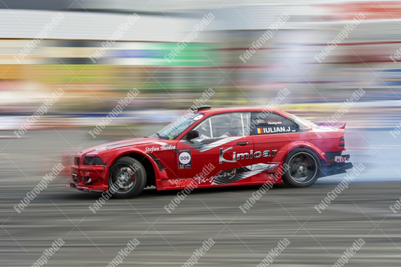 Sport car wheel drifting and smoking on track