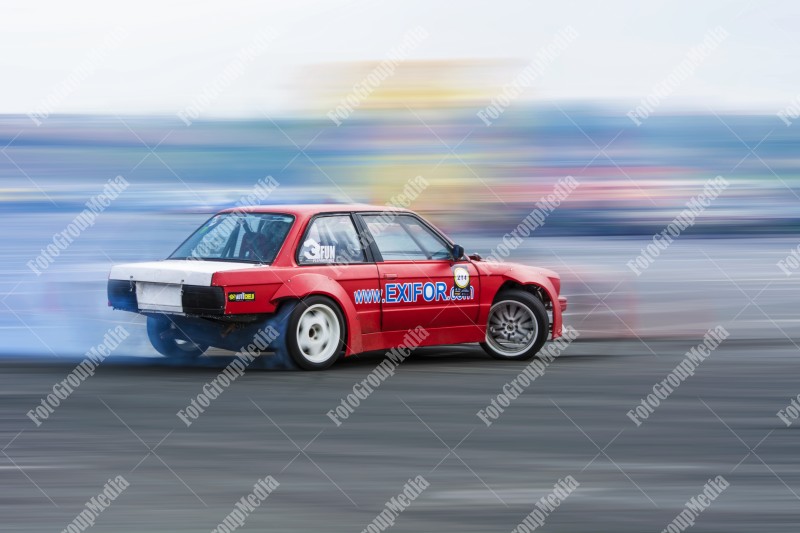 Drift competion, red car getting ready for track